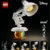 LEGO Ideas Disney Pixar Set - Modellbau für Erwachsene - 3D Puzzle mit versteckten Filmreferenzen - DIY Schreibtisch Deko - Geschenkidee für Sammler 21357 - 11