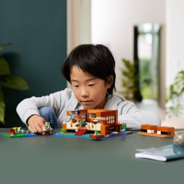 LEGO Minecraft Das Froschhaus - Spielzeug mit Boot, Tierfiguren & Zubehör - Gaming Spielset mit Ruderboot, Ofen, Kuchen und Honig - Gamer Geschenk für Jungen & Mädchen ab 8 Jahren - 21256 - 6