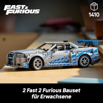 LEGO Technic 2 Fast 2 Furious Nissan Skyline GT-R (R34) Flitzer - Automodell für Erwachsene - mit Driftfunktion, Lenkung, Federung und 6-Zylinder-Motor - Sammlergeschenk für Fans - 42210 - 2