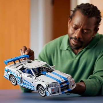 LEGO Technic 2 Fast 2 Furious Nissan Skyline GT-R (R34) Flitzer - Automodell für Erwachsene - mit Driftfunktion, Lenkung, Federung und 6-Zylinder-Motor - Sammlergeschenk für Fans - 42210 - 9
