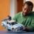 LEGO Technic 2 Fast 2 Furious Nissan Skyline GT-R (R34) Flitzer - Automodell für Erwachsene - mit Driftfunktion, Lenkung, Federung und 6-Zylinder-Motor - Sammlergeschenk für Fans - 42210 - 9