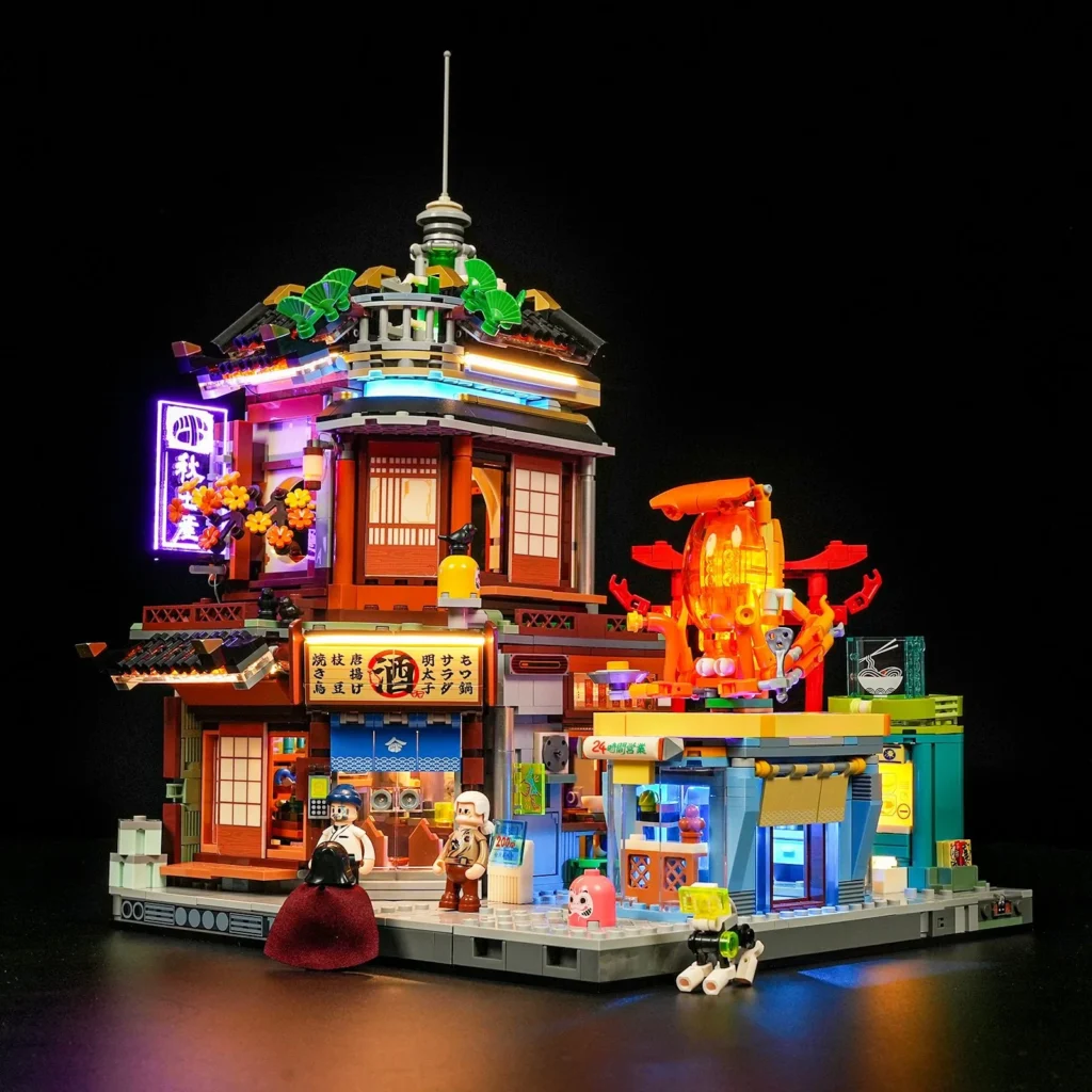 Beleuchtete Vorderansicht des Lumibricks Izakaya mit Tintenfischstand